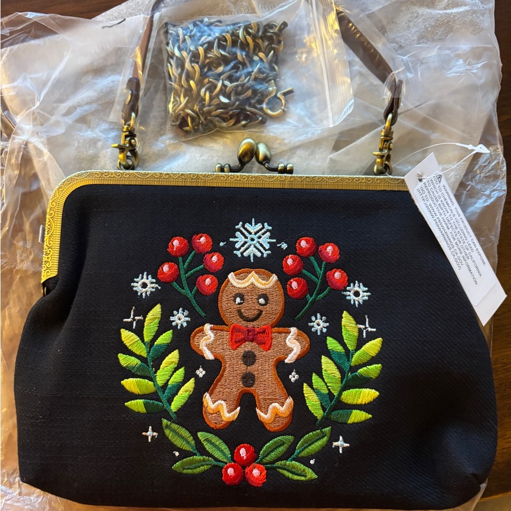 Embroidered Black Handbag with Gingerbread Design